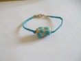 Pulsera de hilo y fimo